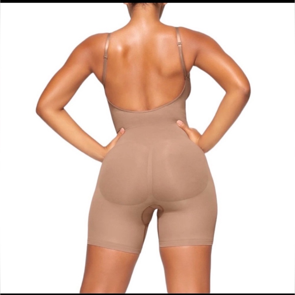 SKIMS Seamless Mid-Thigh Bodysuit in Warm Tan - Picture 2 of 8